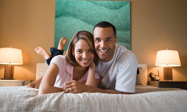 couple-bed-happy