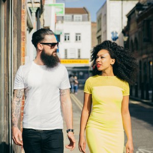 Couple Walking Through The City