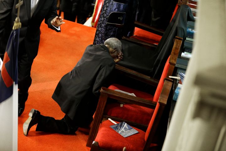 Kneeled down in prayer