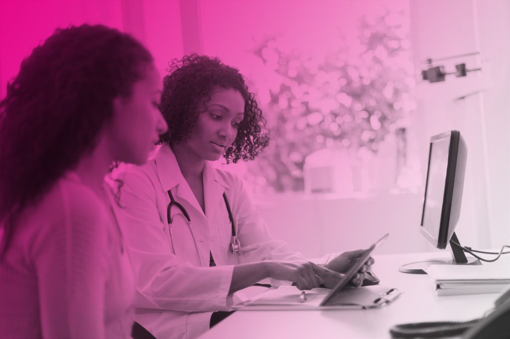 Black Female Patient With Doctor
