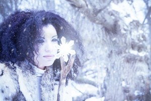 Snow Maiden With Crystal In A Winter Storm