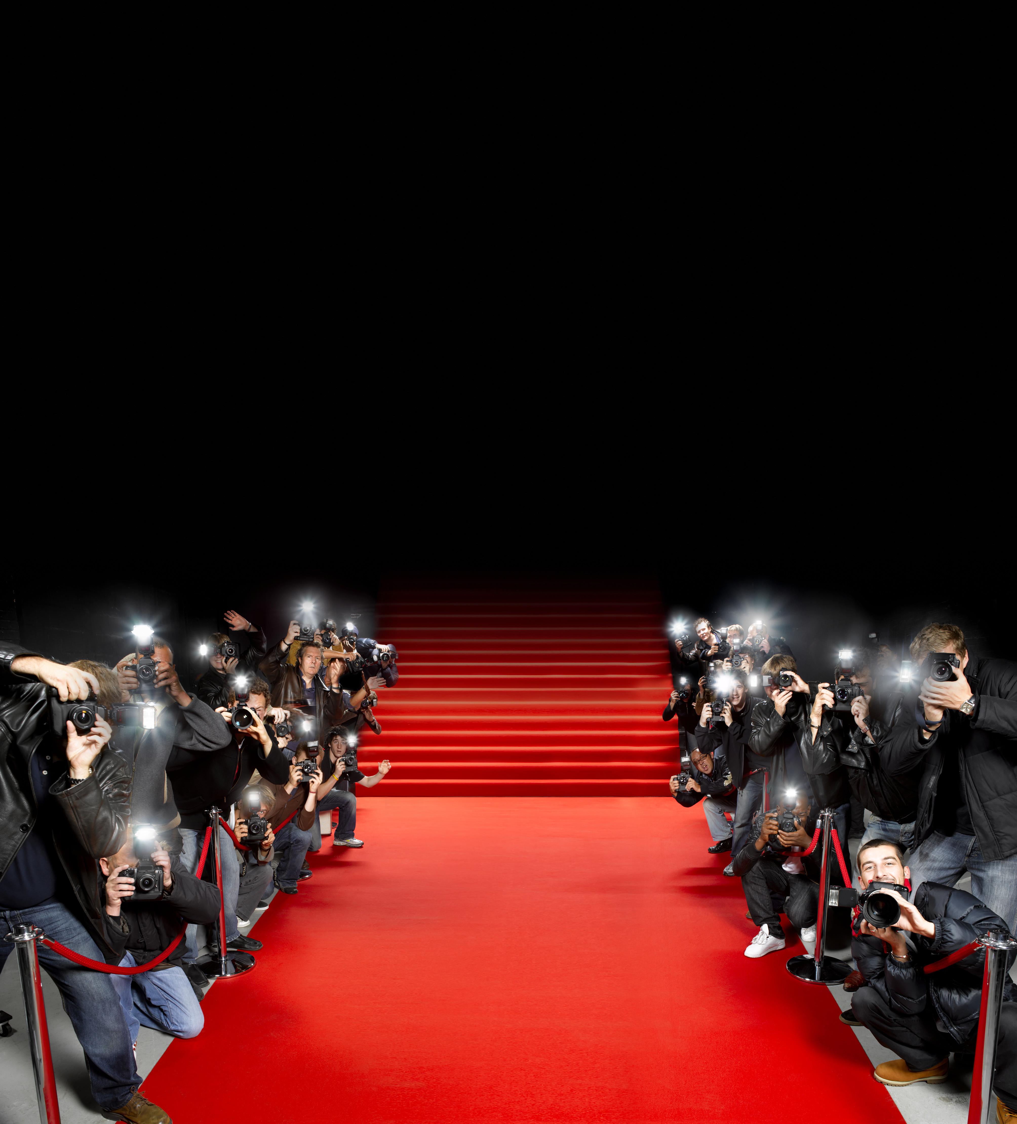 Paparazzi photographers along red carpet