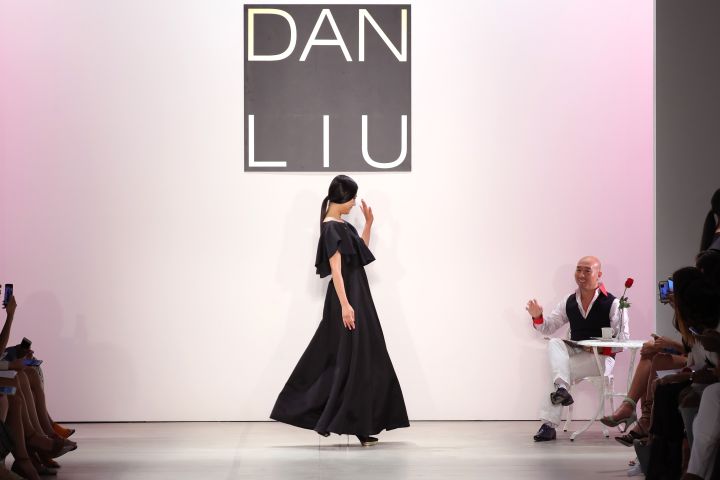 DAN LIU WAVES TO MODEL