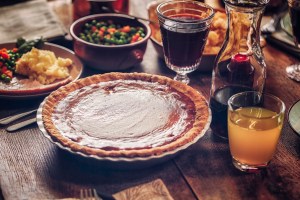 Traditional Stuffed Turkey Holiday Dinner with Vegetables and Pumpkin Pie