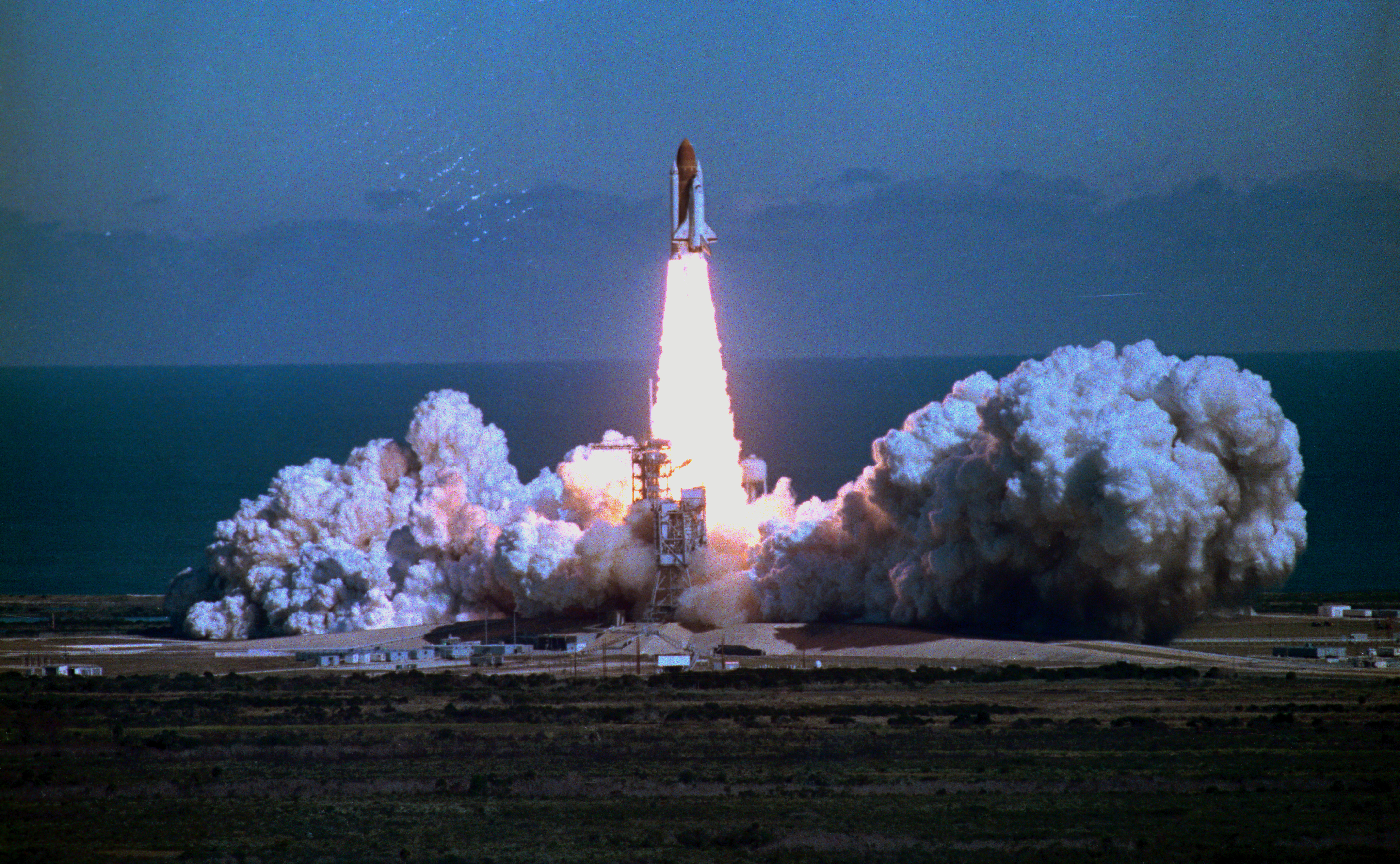 Space Shuttle Challenger Blasting off into Sky
