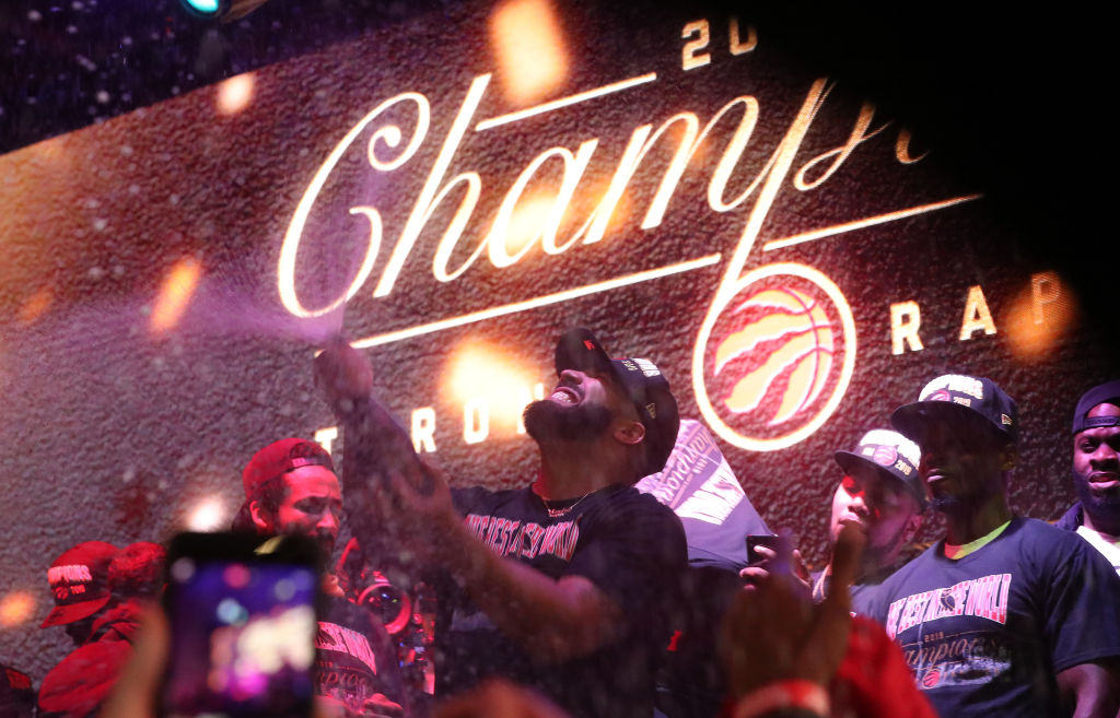 Toronto fans gather in Jurassic Park to watch the Raptors play the Golden State Warriors in game six and win the NBA Finals at Oracle Arena in Oakland ouside