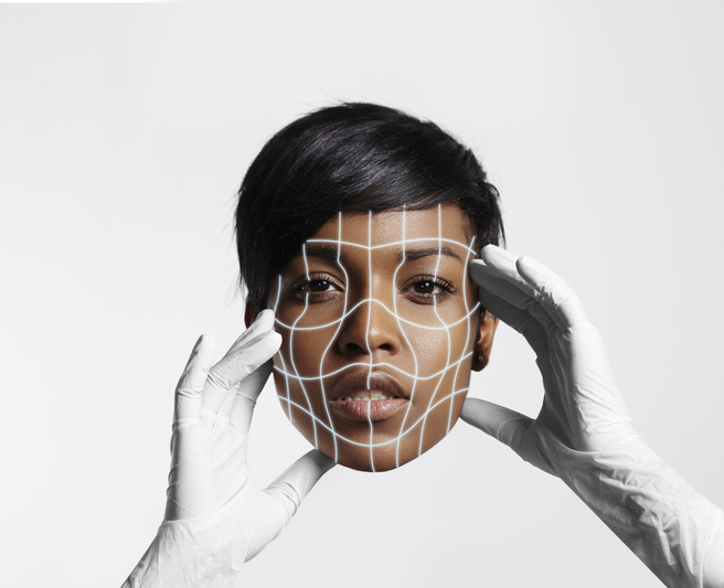 Beauty womans face in hands of doctor