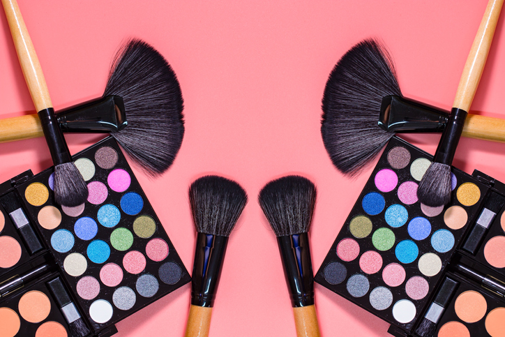 Directly Above Shot Of Eyeshadow Over Pink Background