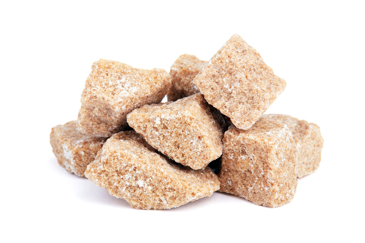 Brown sugar isolated on white background