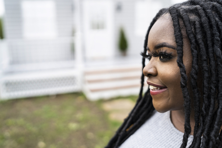 Portrait of smiling young african woman