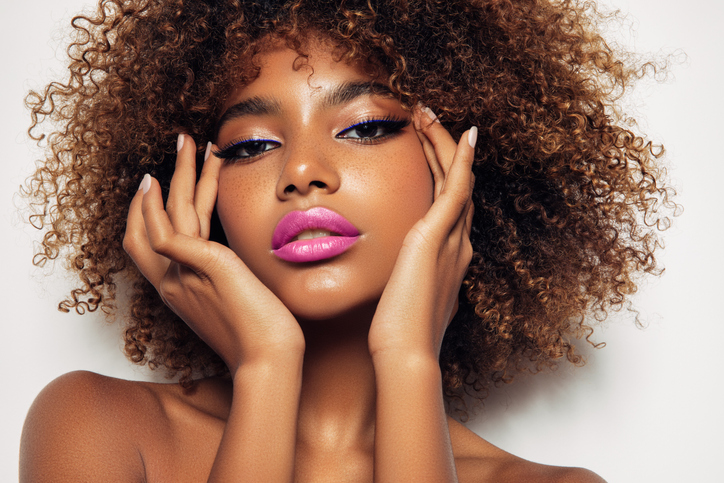 Beautiful girl with curly hairstyle