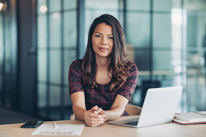 Smiling young black ethnicity businesswoman