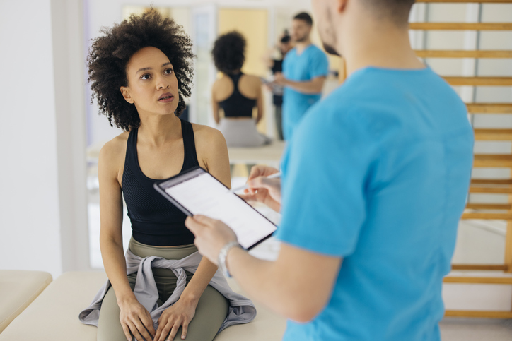 Beautiful African American Woman Talking With the Doctor