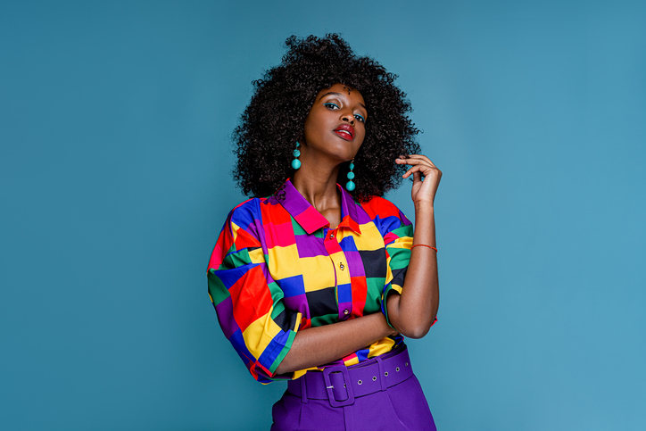 Fashionable woman in colorful shirt