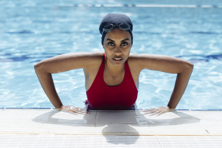 Portrait of young woman in swimming pool