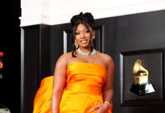 Musical talent pose on the red carpet at the 63rd Annual Grammy Awards show in downtown Los Angeles