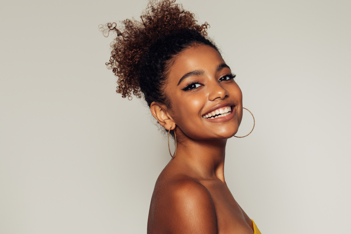 Beautiful afro girl with curly hairstyle