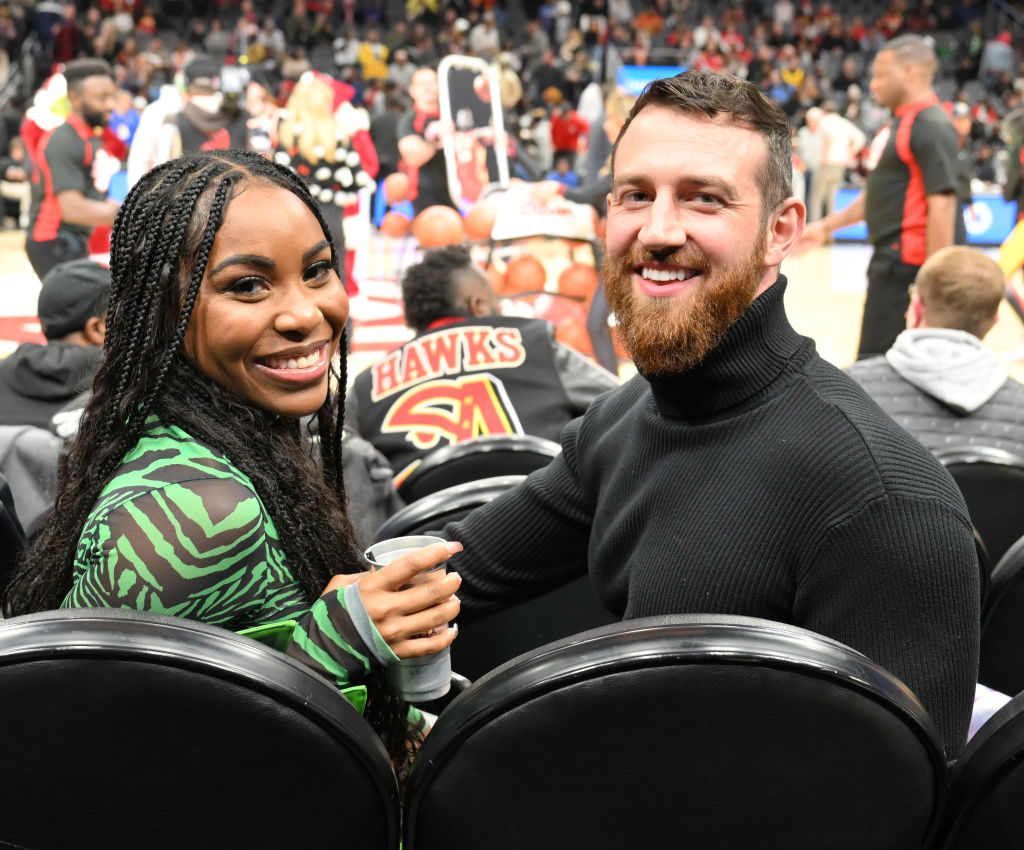 Lauren and Cameron Hamilton Attend Detroit Pistons v Atlanta Hawks