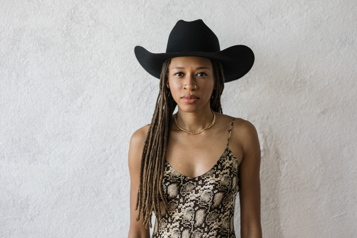 Woman in Black cowboy hat