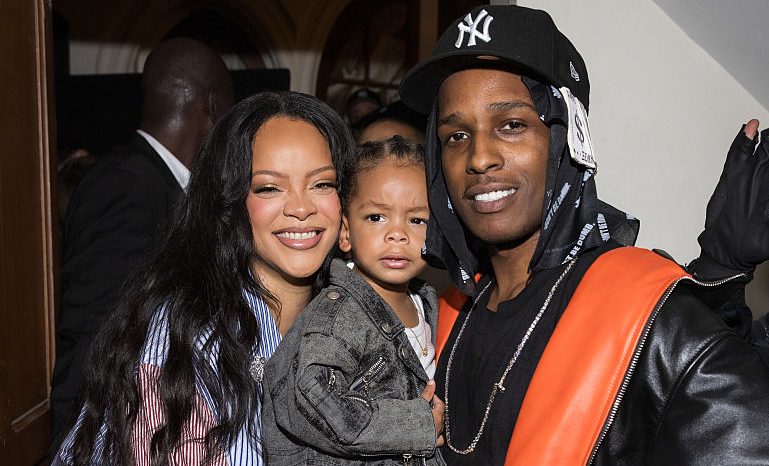 Rihanna, Riot, and A$AP during Paris Fashion week. The family is all smiles and full of style at the AWGE fashion  presentation on June 27, 2025.