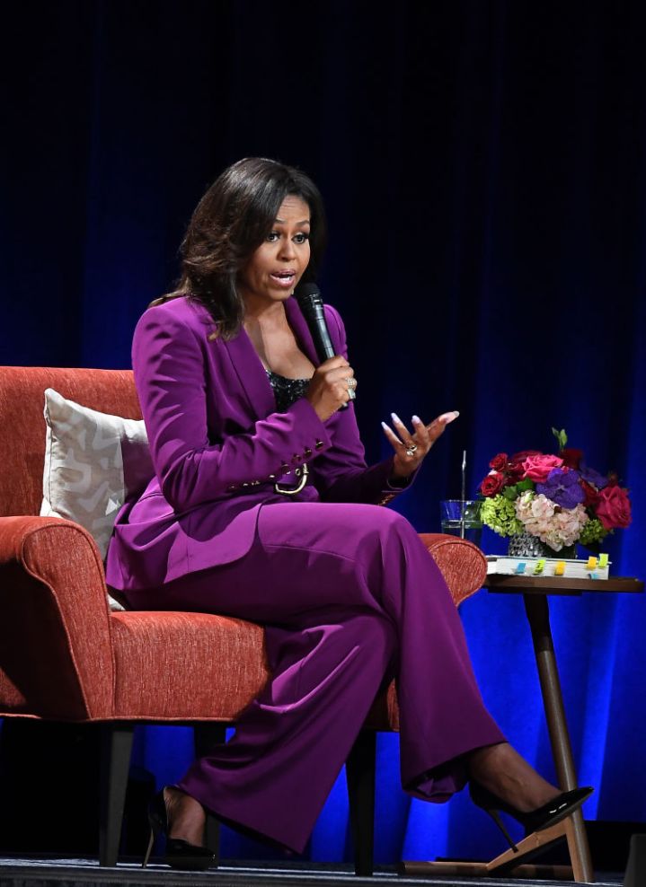 Michelle Obama Sits Pretty In Purple